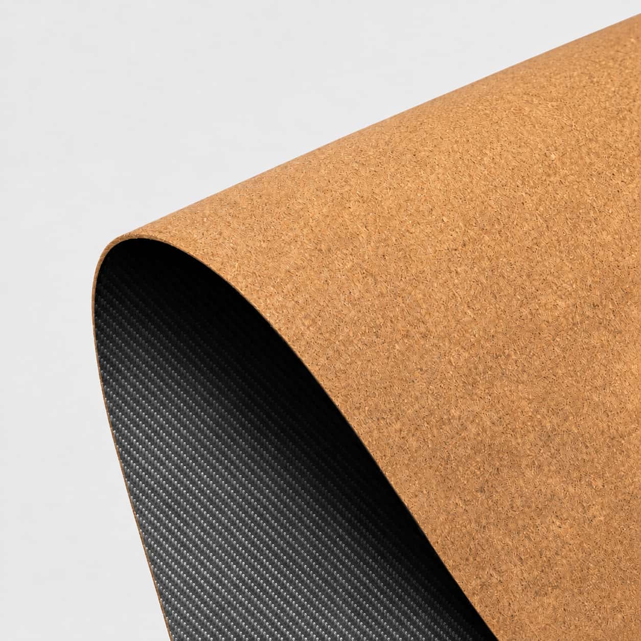 Aovela carbon fiber textured desk mat on a modern minimal desk
