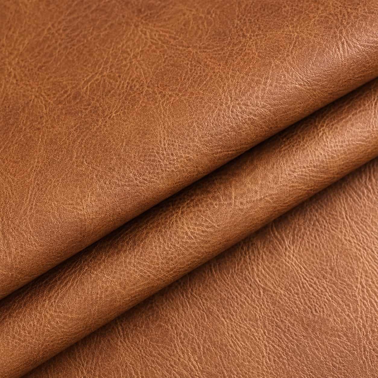 Aovela reversible leather-grain desk mat on a warm wood desk